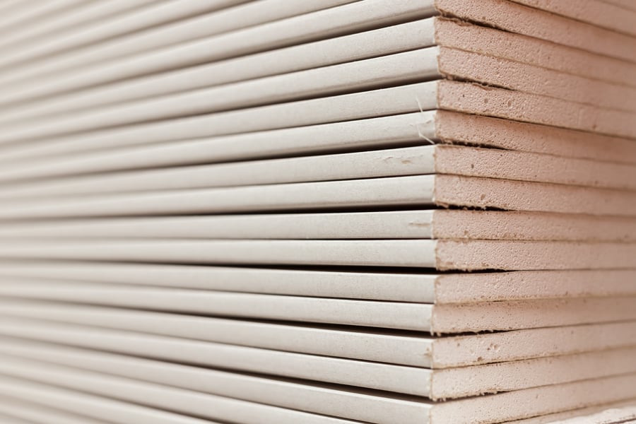 https://27191511.fs1.hubspotusercontent-eu1.net/hubfs/27191511/stack-of-gypsum-boards-drywall-packs-close-up-2023-11-27-05-36-30-utc.jpg